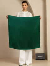Emerald green 100% silk square scarf, 90x90cm, held open by model