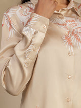 Beige 19 momme silk blouse with crane print, lapel collar, long sleeves, button front