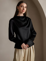 Black silk long sleeve boat neck blouse with pearl cuff details