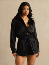 Black silk high-waist A-line shorts with shirred drawstring waistband and side pockets