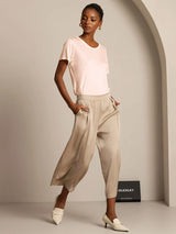 Women’s silk jersey short sleeve round neck T-shirt in soft blush with relaxed beige pants