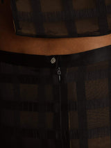 Black pure silk textured grid jacquard crop blouse and high-waist skirt close-up