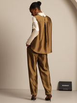 Back view of a camel silk-wool blend vest with button-back closure and matching satin pants