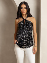 Black silk polka dot halter top with twist-front and keyhole neckline