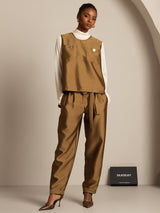 Brown silk-wool blend women's vest with white turtleneck and matching pants