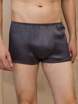 Men's dark gray silk boxer briefs with elastic waistband