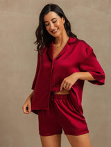 Women’s burgundy silk notch collar pajama set with short sleeves and elastic shorts