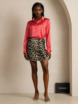Coral pink silk lapel collar shirt with button-down front and long sleeves