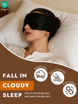 Woman wearing black silk sleep mask on pillow, breathable adjustable eye mask