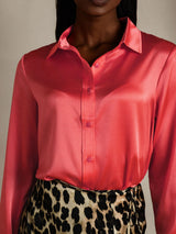 Coral pink silk lapel collar long sleeve blouse with button front and satin sheen