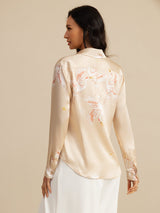 Cream silk long sleeve blouse with crane print and lapel collar, back view