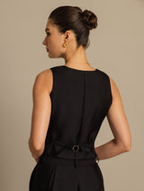 Black sleeveless silk-wool blend vest with fitted waist and buckle back detail
