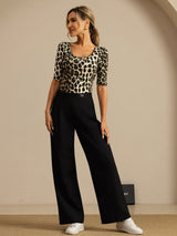 Silk animal print scoop neck half sleeve top with black wide-leg pants