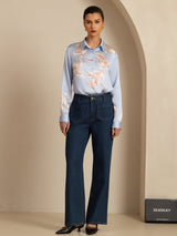 Light blue 19 momme silk blouse with crane print, lapel collar, and button front