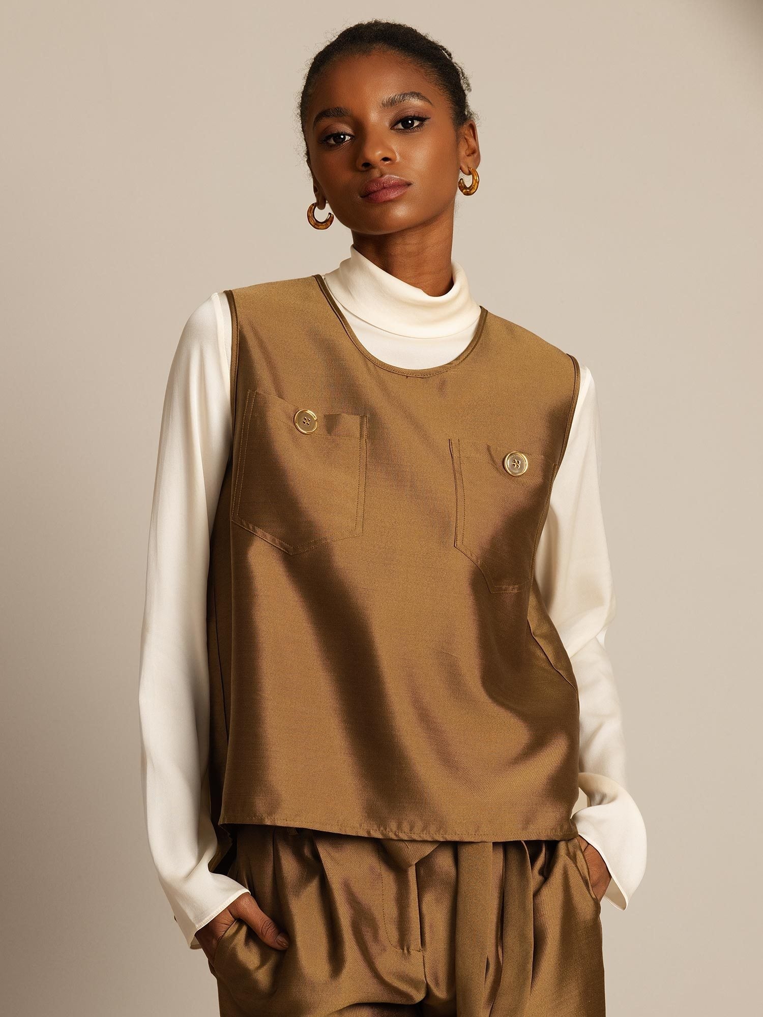 Women's silk-wool blend vest in warm brown with button pockets and back closure