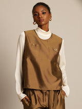 Women's silk-wool blend vest in warm brown with button pockets and back closure