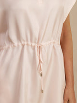 Blush pink silk Henley neck short dress with elastic drawstring waist and metallic tips