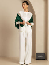 White silk pajama set with green shawl collar, long-sleeve top and wide-leg pants