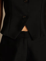 Black silk-wool blend V-neck vest with button front and tailored hem