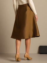 Back view of a brown silk-wool A-line midi skirt with high waist