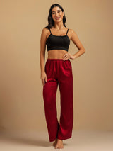 Women's red washable silk wide-leg sleep pants with elastic waist and pleated fit