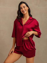 Women’s burgundy silk notch collar pajama set with short-sleeve shirt and elastic shorts