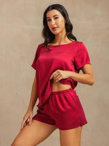 Women's red silk short sleeve pajama set with elastic shorts and side pocket