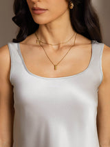Women's silk sleeveless U-neck tank top in light gray, straight fit